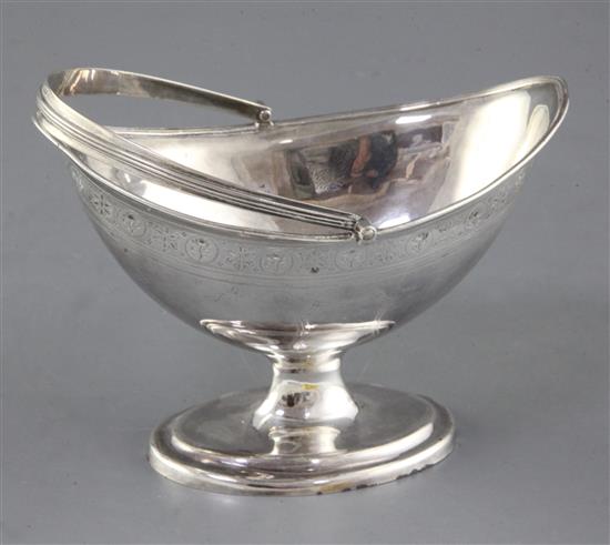 A George III silver bright cut oval boat shaped pedestal sugar basket, by William Abdy II, 7 oz.
